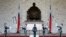 FILE - Honour guards perform in front of a statue of late Nationalist Generalissimo Chiang Kai-shek in Taipei, Feb. 7, 2007.