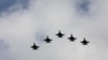 IDF aircraft fly in formation during an inauguration ceremony of a maintenance centre for F-16 fighter jets, in Taichung