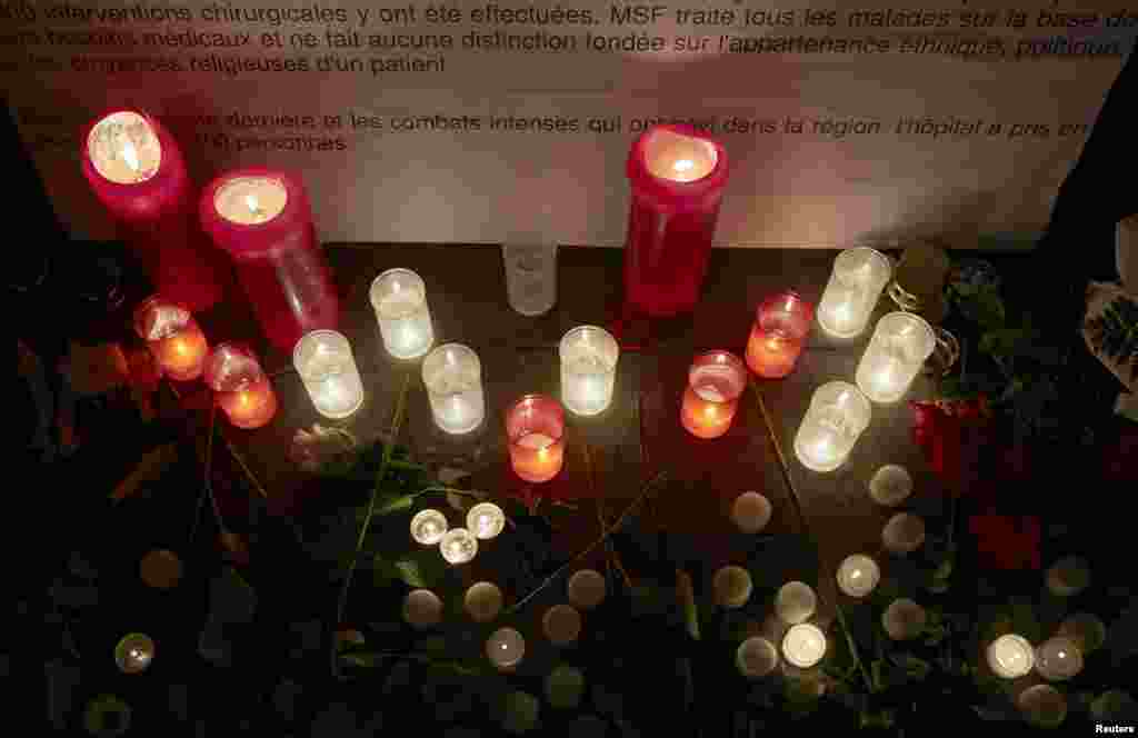 The U.S. military took responsibility on Tuesday for a deadly airstrike on a hospital in the Afghan city of Kunduz, calling it a mistake. Candles are pictured outside the Medecins Sans Frontieres (MSF) headquarters in Geneva, Switzerland, Oct. 7, 2015.