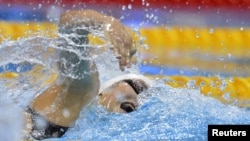 China's Ye Shiwen swims to win the women's 200m individual medley final during the London 2012 Olympic Games at the Aquatics Centre July 31, 2012. 