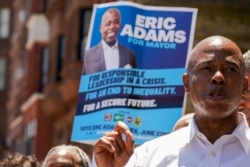 FILE - New York City mayoral candidate Eric Adams speaks during a campaign event, June 17, 2021, in the Harlem neighborhood of New York.