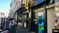  Ofisi ya Western Union mjini Montreiuil Ufaransa. (L. Bryant/VOA) 