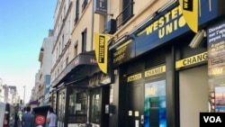  This Western Union office in Montreiuil has seen a drop in clientele. (L. Bryant/VOA) 