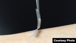 The "smart insulin patch," developed by researchers in the joint UNC/NC State Biomedical Engineering Department. (Credit: The lab of Zhen Gu, Ph.D.)