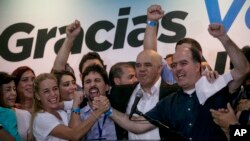 Opposition leaders, from left to right, Lilian Tintori, wife of jailed Venezuelan opposition leader Leopoldo Lopez, Freddy Guevara, of the Voluntad Popular party, Jesus Torrealba, head of the Democratic Unity Movement (MUD) party and deputy Julio Borges c