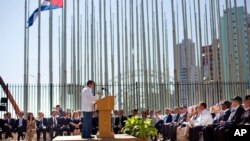 Cuban-American Poet Richard Blanco reads a poem during the reopening ceremony of the U.S. embassy in Havana, Cuba, Aug. 14, 2015. 