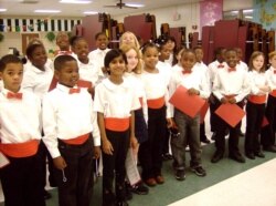 Dolica Gopisetty, 8 years old, front row, participates in a 3rd-grade Christmas choir performance at Brennen Elementary School, Columbia, South Carolina, December 2006. (Photo courtesy of the Gopisetty family)