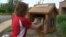 The idea behind the little free libraries was born three years ago in Hudson, Wisconsin, when former teacher and book lover built a miniature model of a library. (VOA)