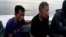 Malaysian hostages Tayudin Anjut (left) and Abdurahim Bin Sumas were rescued in Sulu province, southern Philippines, March 23, 2017. The two Malaysian sailors had been held captive for eight months by Muslim militants. On Saturday, a cargo ship's captain was rescued.