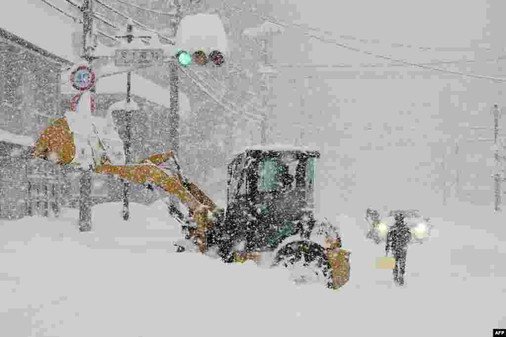 Heavy snow falls across northern Japan, in the city of Obihiro, Hokkaido prefecture.