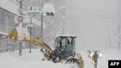 Heavy snow falls across northern Japan, in the city of Obihiro, Hokkaido prefecture.