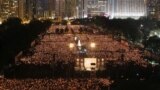 Tens of thousands of people attend a candlelight vigil at Hong Kong's Victoria Park Monday, June 4, 2012 to mark the 23rd anniversary of the Chinese military crackdown on the pro-democracy movement in Beijing.