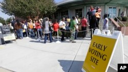 FILE - Voters line up during early voting in Raleigh, North Carolina, Oct. 20, 2016.