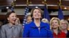 House Minority Leader Nancy Pelosi Calif., accompanied by women House Democrats, announces during a news conference on Capitol Hill, Nov. 14, 2012, that she wants to remain as the top Democrat in the House of Representatives. 