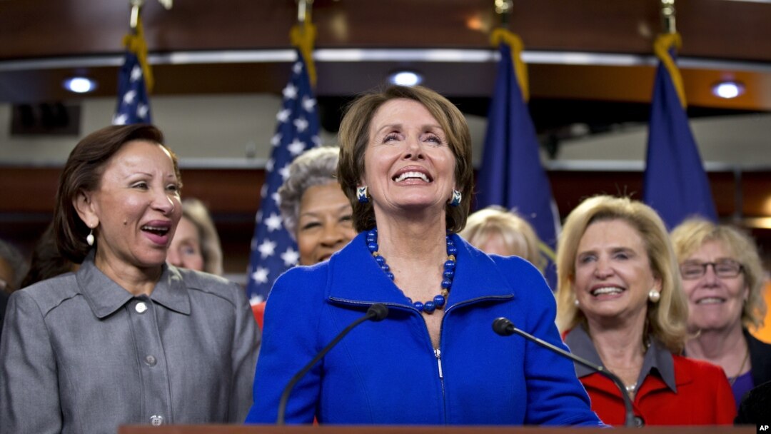 House Minority Leader Nancy Pelosi, accompanied by women House Democrats, announces during a news conference on Capitol Hill that she wants to remain as the top Democrat in the House of Representatives, Nov. 14, 2012. 
