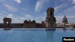 A historic building is seen from the rooftop infinity pool at the Gran Hotel Manzana, owned by the Cuban government and managed by Swiss-based Kempinski Hotels SA, in Havana, Cuba, May 12, 2017. 
