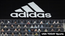 A general view of the stadium with fan cutouts in seats below an Adidas branded tarp before the MLS game between the D.C. United and the New England Revolution at Audi Field in Washington.