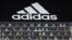 Une vue générale du stade avec des découpes de fans dans les sièges sous une bâche de marque Adidas avant le match de MLS entre le D.C. United et le New England Revolution à Washington.