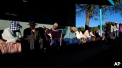 Residents wait for their turns to cast their votes during an election to decide if it keeps faith with one of the Africa's longest-ruling parties, in Gaborone, Botswana, Oct. 30, 2024. 