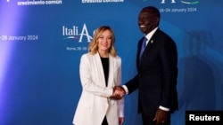 Italy's Prime Minister Giorgia Meloni meets with President of Kenya William Ruto inside the Madama Palace (Senate) as the European nation hosts the Italy-Africa summit in Rome, on January 29, 2024.