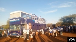 Umbrella for Democratic Change activists gather for a rally after their failed protest in Gaborone, Botswana, Oct. 26 2024. (Mqondisi Dube/VOA)