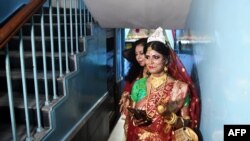 Transgender woman Tista Das, 38, arrives for her wedding to a transgender man Dipan Chakravarthy, 40, in Kolkata, India, Aug. 5, 2019.