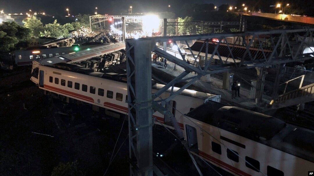 This photo released by Military News Agency shows a general view at the site of a train derailment in Lian in northern Taiwan, Oct. 21 2018. 