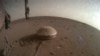 Esta imagen publicada por la NASA el lunes 19 de diciembre de 2022 se muestra el robot InSight de la NASA en Marte. 
