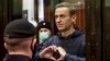 En sus primeros comentarios sobre Navalny, Putin dice que estaba a favor de intercambiarlo