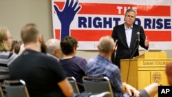 Former Florida Gov. Jeb Bush speaks during a town hall meeting, May 16, 2015, at Loras College in Dubuque, Iowa. 