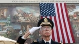 FILE - U.S. Army veteran 2nd Lt. Allen Brandstater salutes during a Veterans Day observance in Los Angeles on Nov. 11, 2022. (AP Photo/Damian Dovarganes)