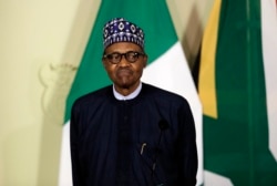 FILE - Nigerian President Muhammadu Buhari attends a press briefing in Pretoria, South Africa, Oct. 3, 2019.