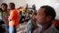 FILE - African migrants are seen in their dormitory at a detention center in Sorman, 55 km (34 miles) west of Tripoli, Libya.
