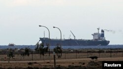 A North Korean-flagged tanker is docked at the Es Sider export terminal in Ras Lanuf, Libya, March 8, 2014.