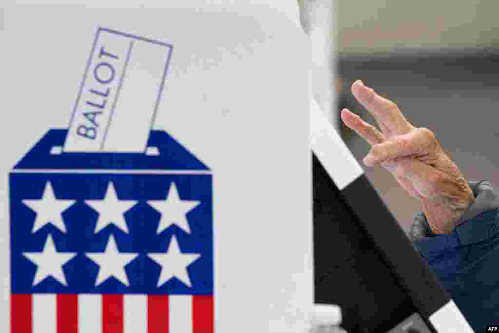 A person votes during early voting at a polling station in Black Mountain, North Carolina.