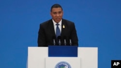 Jamaica's Prime Minister Andrew Holness delivers a speech at the opening ceremony of the China International Import Expo in Shanghai on Tuesday, Nov. 5, 2019.