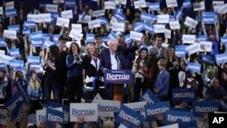 FILE - Democratic presidential candidate Sen. Bernie Sanders, I-Vt., speaks during a primary night election rally in Essex Junction, Vt., March 3, 2020. 