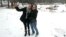 Emily, left, and her sister Stephanie pose for a selfie in the snow at a rest stop, Nov. 3, 2017, at Donner Summit, Calif. A light snow fell in the upper elevations of the Sierra Nevada overnight, with up to 2 feet of snow forecast in elevations above 8,000 feet and at least a foot of snow is expected in areas above 6,000 feet.