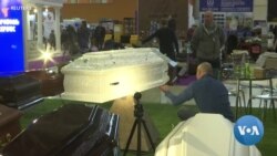 Lying in Style: Crystal-Studded Coffin Highlights Moscow Funeral Show