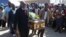 Mourners carry the casket of Andries Motlapula Ntsenyeho, one of the 34 striking platinum mineworkers shot dead at Lonmin's Marikana mine, at his home town of Sasolburg in South Africa's Free State province, September 1, 2012.