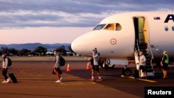 The New Zealand Warriors NRL team, which will live and train in Australia under quarantine conditions due to the coronavirus disease (COVID-19), arrives at the Tamworth Airport in Tamworth, Australia, May 3, 2020.
