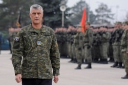 FILE - Hashim Thaci, who then was Kosovo's president, attends a ceremony of security forces, in Pristina, Kosovo, Dec. 13, 2018.