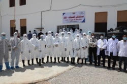 Health workers are seen in Hadramout province, where Yemen recorded its first COVID-19 case last month, on May 1, 2020. (Courtesy of Hadramout's health department)
