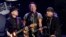 FILE - In this Tuesday, March 15, 2016, photo, Bruce Springsteen (C) performs with Nils Lofgren (L) and Steven Van Zandt of the E Street Band during their concert at the Los Angeles Sports Arena in Los Angeles.