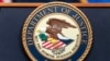 FILE - The U.S. Department of Justice seal is seen at the DOJ office in Washington on May 16, 2023. The DOJ said on Sept. 6, 2024, that Canada had arrested a Pakistani man who was allegedly planning an attack in New York.