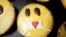 Cakes that look like emojis with protective masks are seen at the bakery Schuerener Backparadies as the spread of COVID-19 continues in Dortmund, Germany, April 9, 2020.