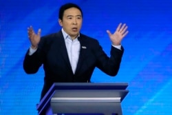 Democratic presidential candidate entrepreneur Andrew Yang speaks during a Democratic presidential primary debate, Feb. 7, 2020, hosted by ABC News, Apple News, and WMUR-TV at Saint Anselm College in Manchester, N.H.