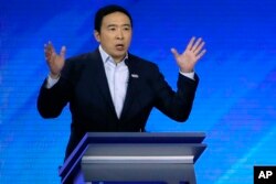 Democratic presidential candidate entrepreneur Andrew Yang speaks during a Democratic presidential primary debate, Feb. 7, 2020, hosted by ABC News, Apple News, and WMUR-TV at Saint Anselm College in Manchester, N.H.