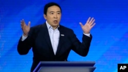 Democratic presidential candidate entrepreneur Andrew Yang speaks during a Democratic presidential primary debate, Friday, Feb. 7, 2020, hosted by ABC News, Apple News, and WMUR-TV at Saint Anselm College in Manchester, N.H.