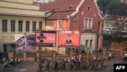 A general view of a billboard promoting the current President of Madagascar Andry Rajoelina as a candidate in the 2023 presidential election in Antananarivo on October 11, 2023. (Photo by RIJASOLO / AFP)